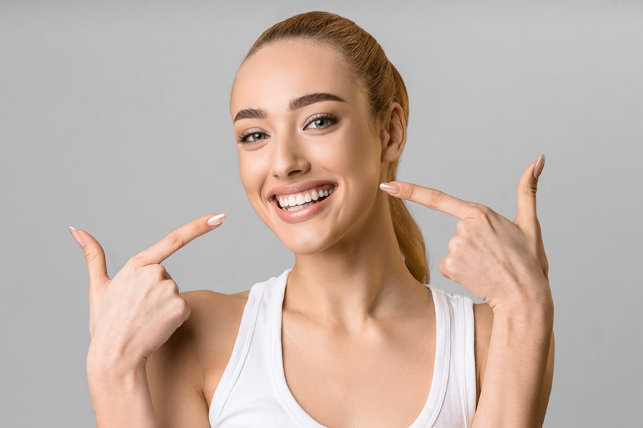 girl smiling wearing white sando